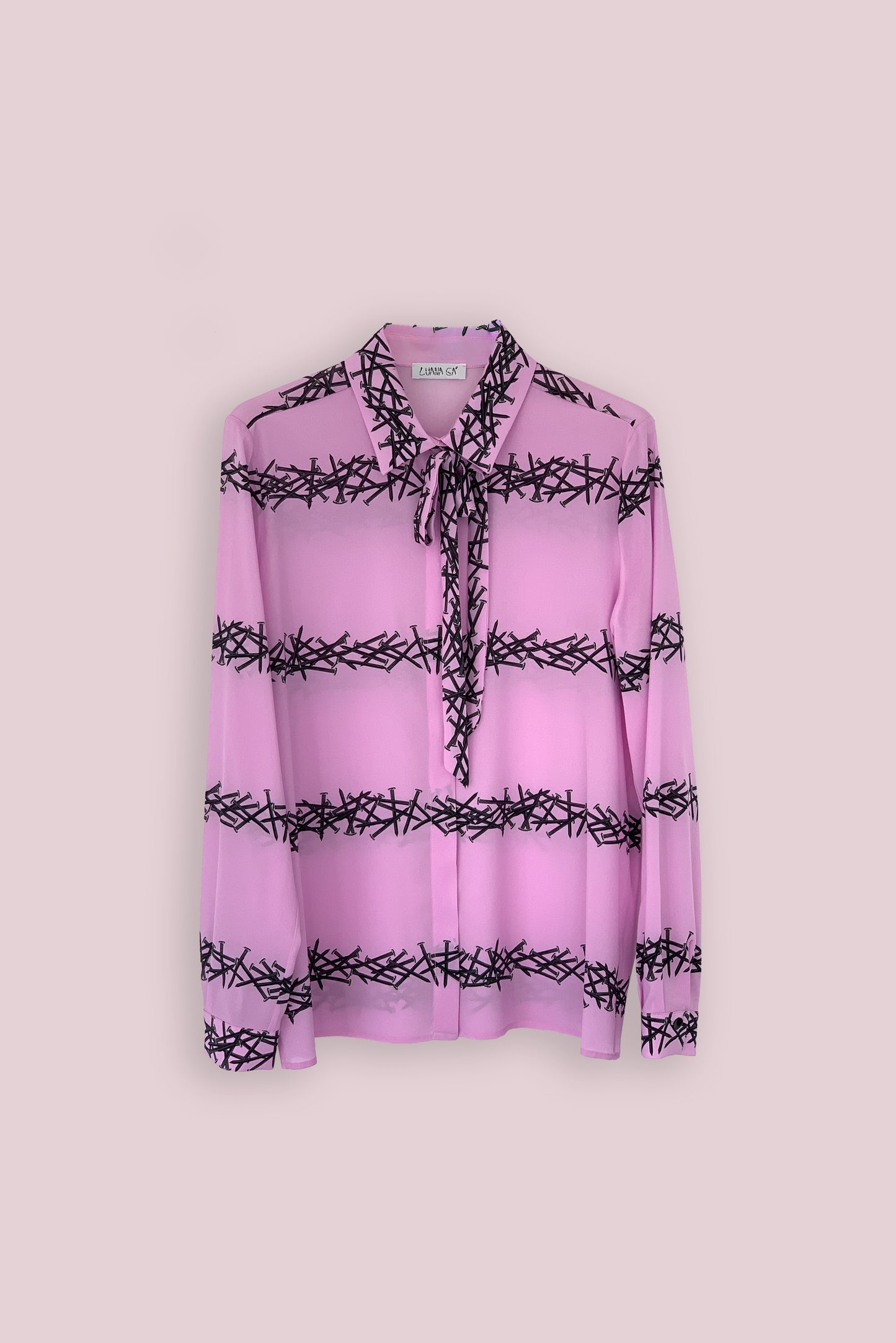  Printed shirt Made in Italy.This Luana Ga' shirt feature a print of lines of nails with a Orchid colour ground.The bow can be used also as a belt