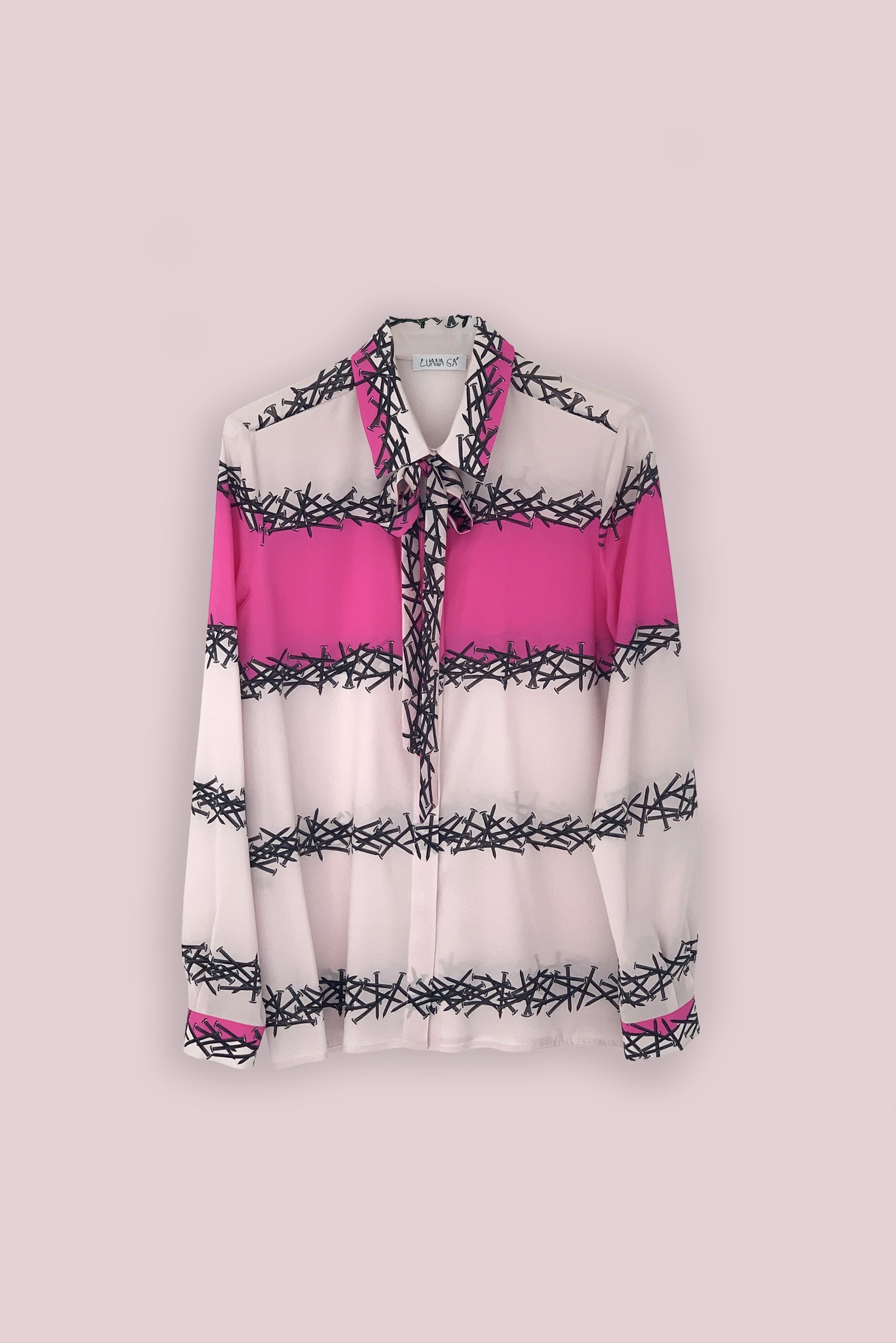 Luana Ga' printed silk shirt.Lines of nails with a central shocking pink color block