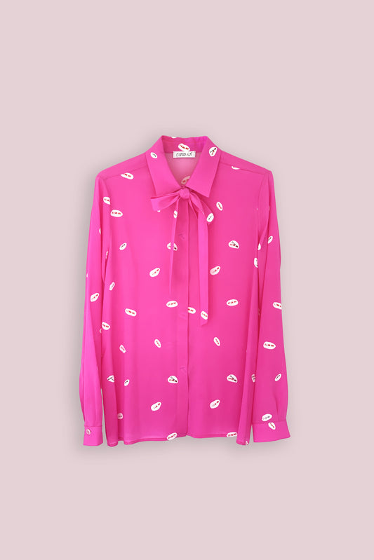 Luana Ga' printed silk shirt in shocking pink colour.The bow can be used also as a belt.