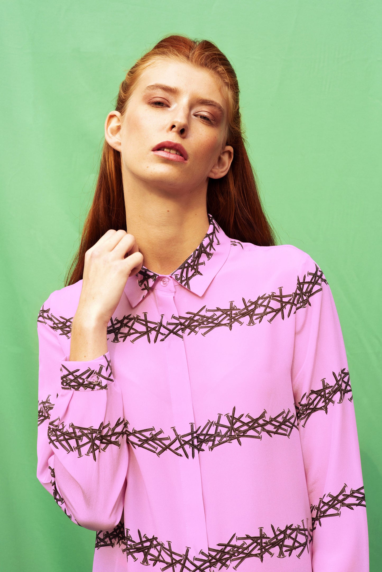 Luana Ga' silk shirt in Orchid colour ground with printed lines of nails