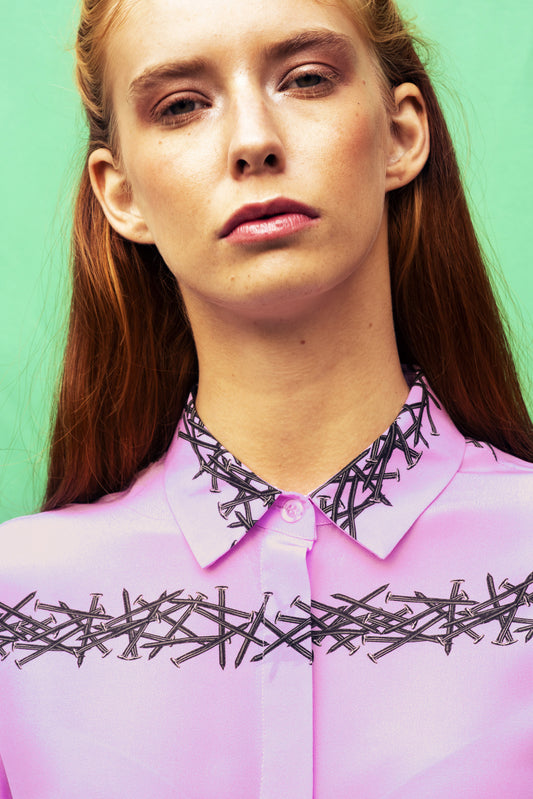 Luana Ga' silk shirt in Orchid colour ground with printed lines of nails